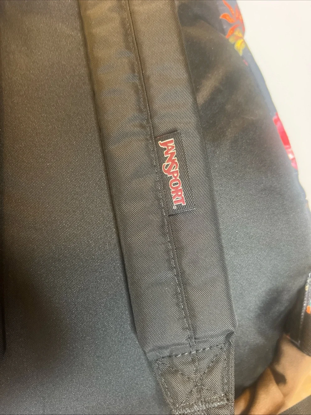 Jansport Black Floral Backpack with Pink and Orange Blooms